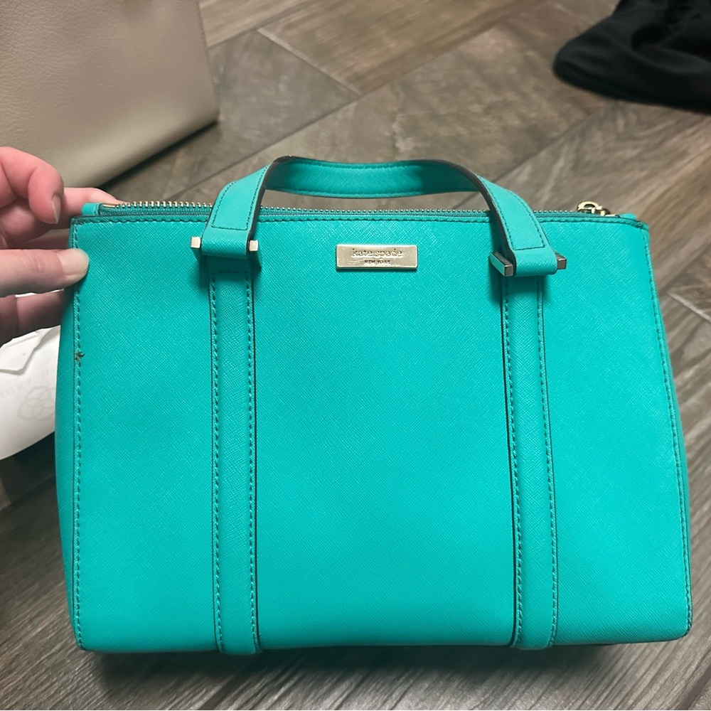 Kate spade bag teal minor stain ( pictured )